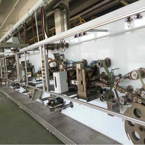 What is the cost of sanitary pad making machine?